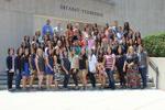 large group of student in front of theatre